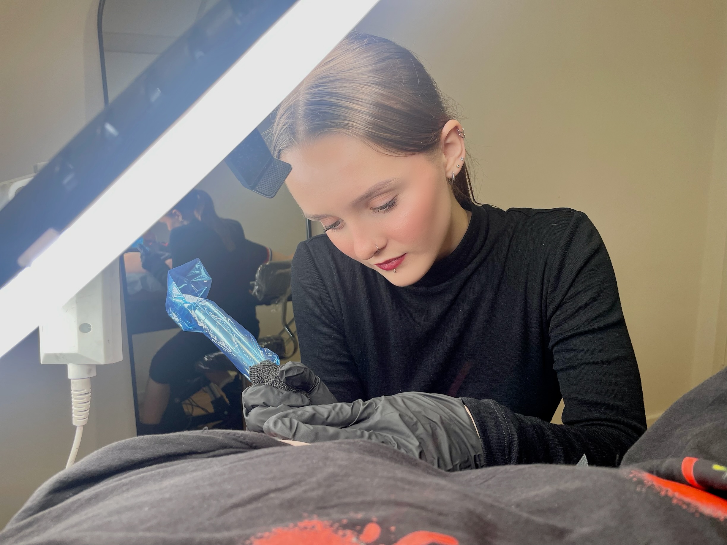 Fine line tattoo artistry